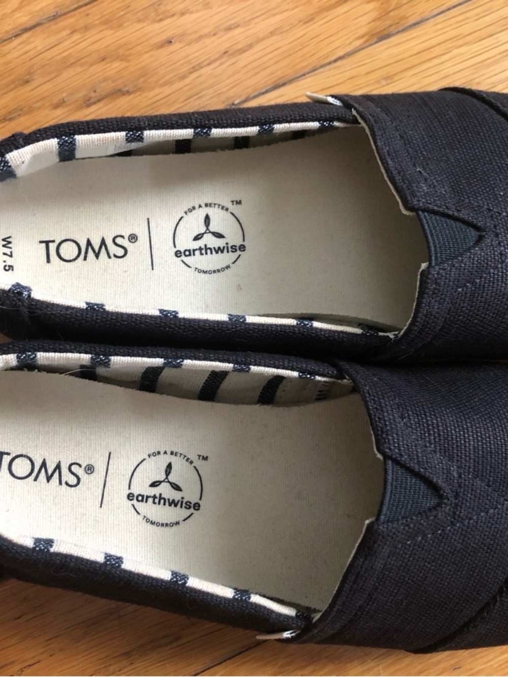 TOMS Black Canvas Slip-Ons